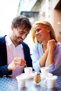 male and female couple at a cafe
